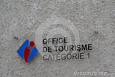 Office de tourisme French tourism office text sign and logo front of wall building Editorial Stock Photo