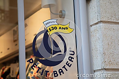 Petit Bateau logo text and sign brand 130 years anniversary facade of kids children Editorial Stock Photo