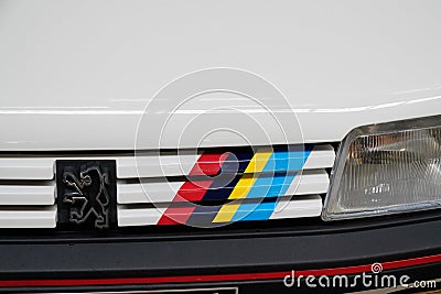 Peugeot 205 GTI logo brand and sign front of sport gt ancient vintage car french Editorial Stock Photo