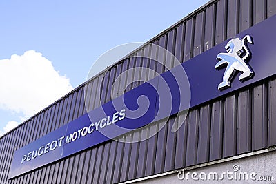 Peugeot motocycles text logo and brand sign front of store motorcycle scooter bike Editorial Stock Photo