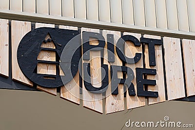 Picture boutique brand logo and sign text on wall wooden facade store Editorial Stock Photo