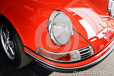 Porsche 911 classic sport vintage car iconic front headlight red orange racing vehicle Editorial Stock Photo