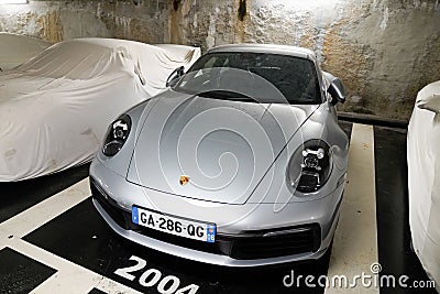 Porsche 911 grey modern sport car in public underground parking Editorial Stock Photo