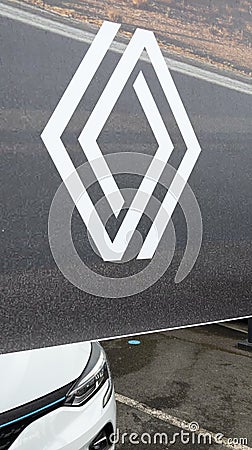 Renault brand sign and new logo on car dealership windows automobiles store signage Editorial Stock Photo
