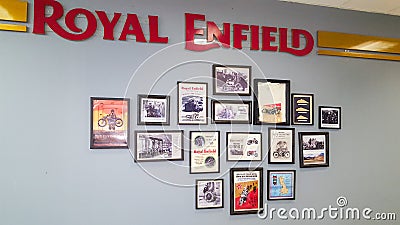 Royal Enfield motorcycle decoration framed photo wall in interior dealership store of Editorial Stock Photo