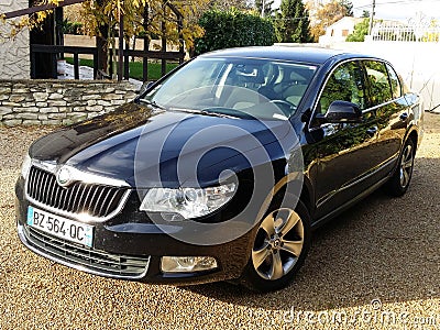 Skoda Superb family car parked in side front view Editorial Stock Photo