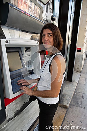 Bordeaux , Aquitaine / France - 03 03 2020 : societe generale atm bank facade french store with woman receipt cash machine in Editorial Stock Photo