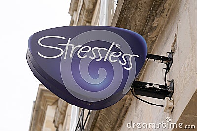 Stressless logo sign in storefront of manufacturer and distributor of mattresses Editorial Stock Photo
