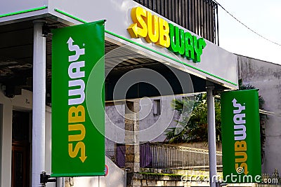 Subway logo text and brand sign restaurant facade American fast food restaurant shop Editorial Stock Photo