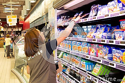 Bordeaux , Aquitaine / France - 04 16 2020 : super U hypermarket woman working in supermarket Editorial Stock Photo