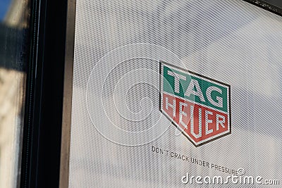 Tag Heuer logo and text sign front of store watches swiss manufacturing company Editorial Stock Photo