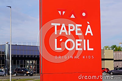 Tape a l`oeil logo and text sign of French clothing brand for children and babies Editorial Stock Photo