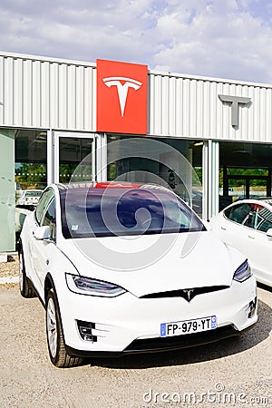 Tesla Model 3 white electric car vehicle in dealership new cars sale ready for Editorial Stock Photo