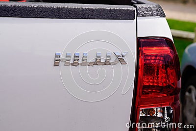 Toyota Hilux logo text and sign brand Detail silver white car pickup Editorial Stock Photo