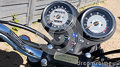 Triumph logo sign on speedometer dashboard bonneville t100 motorcycle 50th anniversary Editorial Stock Photo