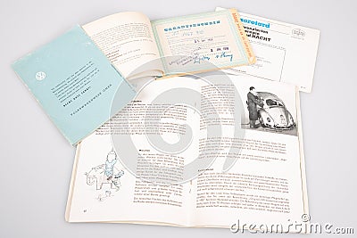 Volkswagen vw logo sign 1950s vintage car service manual books flyer and leaflet on Editorial Stock Photo