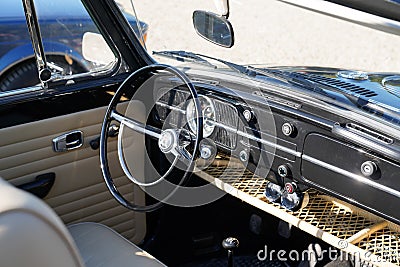 Vw Volkswagen Beetle ancient vintage car interior seat dash board and steering wheel Editorial Stock Photo