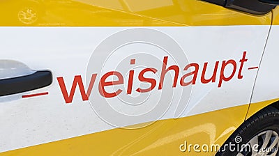 Weishaupt logo sign brand on panel van of gas and oil boilers heat pumps and burners Editorial Stock Photo
