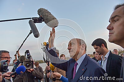 BORDEAUX, FRANCE - 22 NOVEMBER 2014 : Alain Juppe, mayor of the city of Bordeaux walking on the quays of the Garonne Editorial Stock Photo