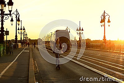 Pont de Pierre bridge and modern city tramway in Bordeaux Editorial Stock Photo