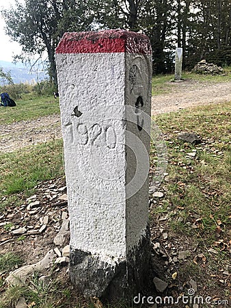 Border marker (border signpost, border stone) on the state boundary in Poland Stock Photo