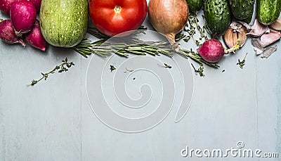 Border with radish courgette tomato cucumber onion herbs, concept autumn vegetables Stock Photo