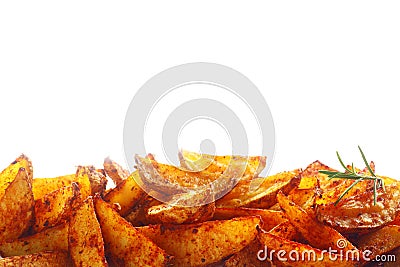 Border of spicy fried potato wedges Stock Photo