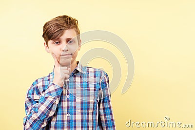 Bored disinterested boy with tired face Stock Photo