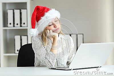 Bored employee working at office in christmas Stock Photo