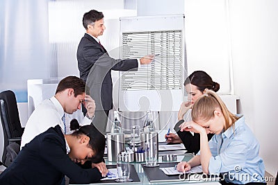 Bored employees in business meeting Stock Photo