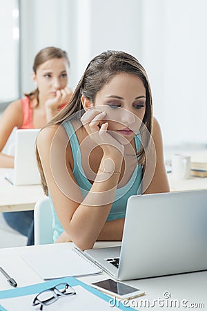 Bored girl at school Stock Photo