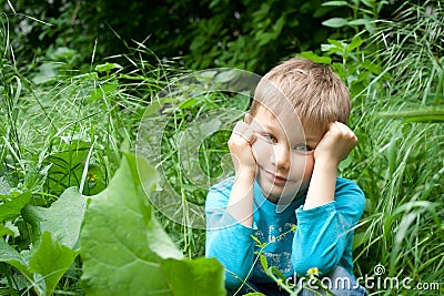 Bored little boy on walk Stock Photo