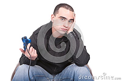 Bored man with a joystick for game console Stock Photo