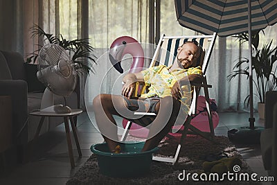 Bored man spending summer vacations at home Stock Photo