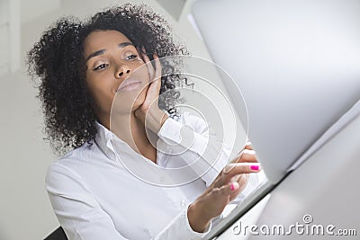 Bored office employee from Africa Stock Photo