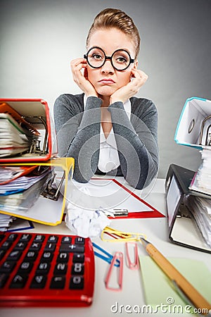 Bored office employee at work. Stock Photo