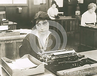 Bored typist Stock Photo