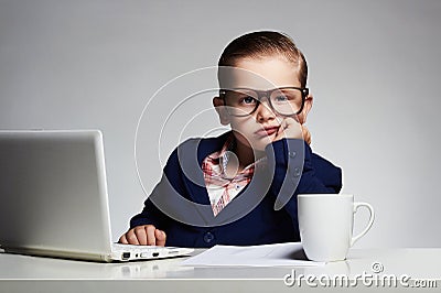 Boring job. Young business boy. child in glasses. little boss in office Stock Photo