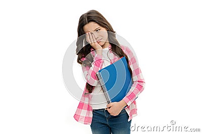 Boring lesson. Tired kid. Providing books for primary school. Adorable little girl with school exercise book. Cute small Stock Photo