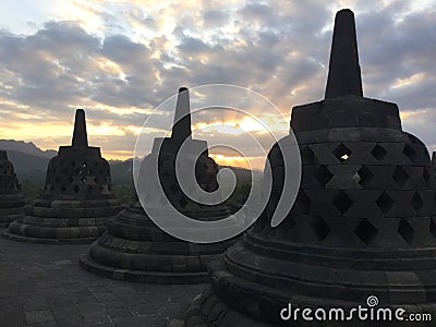 Borobudur Stupas. Buddhist temple at sunset . Near Yogyakarta on Java Island, Indonesia Stock Photo