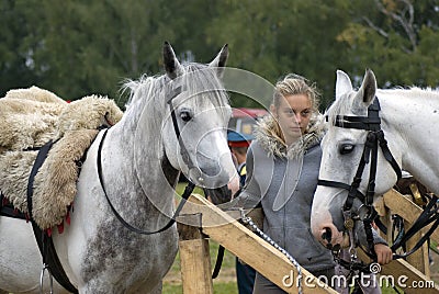 A woman horse rider at Borodino battle historical reenactment in Russia Editorial Stock Photo