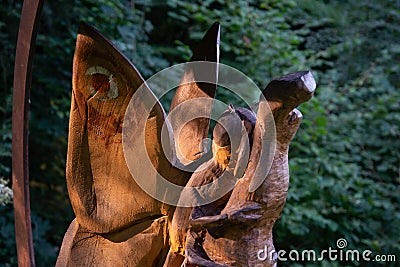 Gnome forest. Wooden sculptures, Monte Guglielmo, Brescia, Italy Editorial Stock Photo