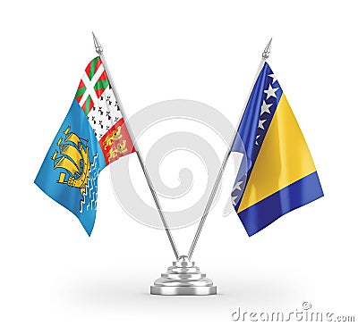 Bosnia and Herzegovina and Saint Pierre and Miquelon table flags isolated Stock Photo