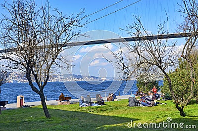 Bosphorus. Uskudar Kuzguncuk families who seaside picnic. Editorial Stock Photo