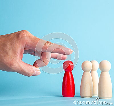 The boss big hand flicking the dismissed employee.Crisis and unemployment, humiliating dismissal Stock Photo
