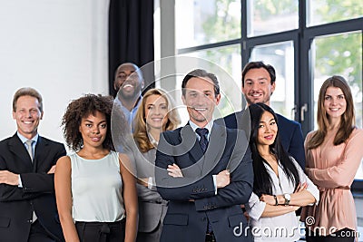 Boss And Business People Group With Mature Leader On Foreground In Office, Leadership Concept, Successful Mix Race Team Stock Photo