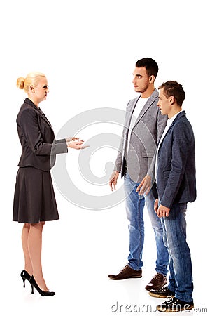 Boss businesswoman screaming at her employees Stock Photo