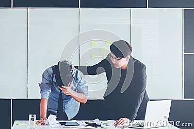 Boss consolation Asia cheers at business, depressed people, employees blame leaders for missing team deadline Stock Photo