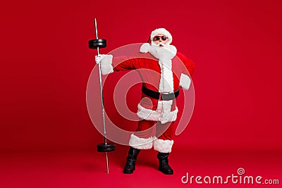 Boss of gym. Full length photo of cool retired old man white beard hold barbell shock light weight wear santa x-mas Stock Photo