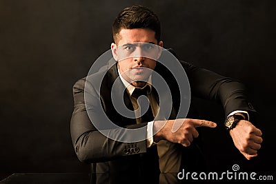Boss minding the time Stock Photo
